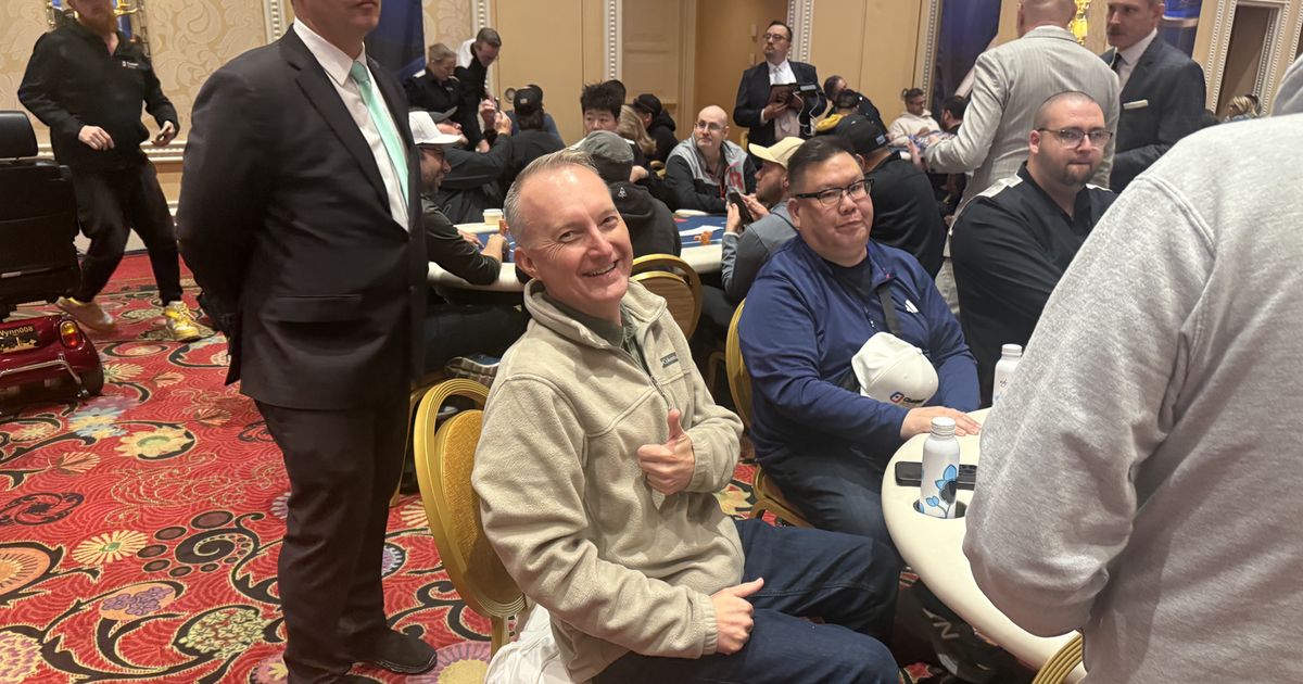 Buster Collins smiles when he learns he cashed!